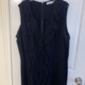 Sleeveless black dress with ruffle detail